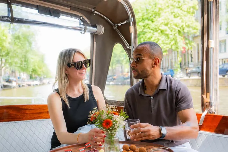Amsterdam Small Group Canal Cruise Including Snacks & Drinks — a boat tour from Amsterdam, Netherlands