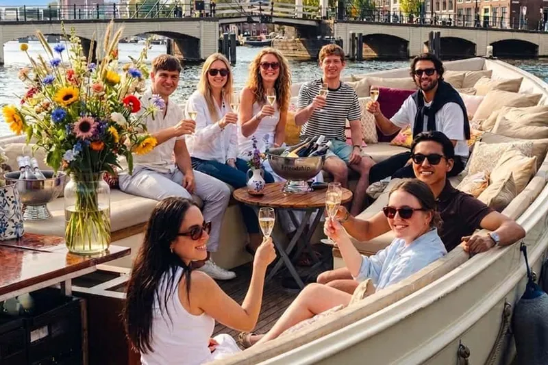 Luxury Canal Cruise with Unlimited Cocktails/Bubbles Option — a boat tour from Amsterdam, Netherlands