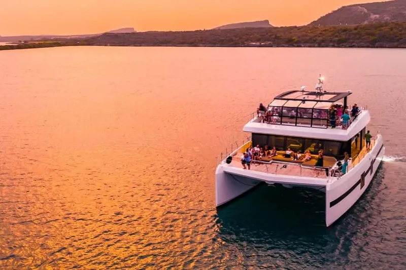 Caracas Bay: Sunset All-Inclusive Party on a Catamaran — a boat tour from Curacao, Curaçao