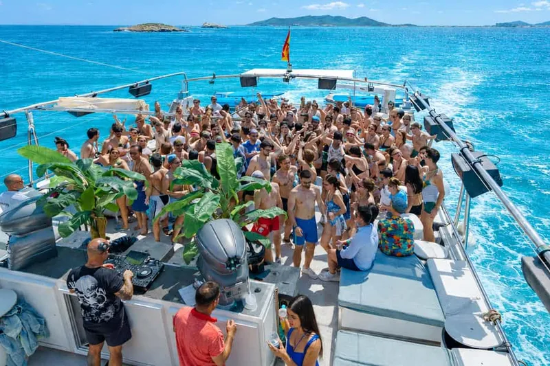 Catamaran Party with DJ, Saxophonist, Club Ticket & Open Bar — a boat tour from Ibiza, Spain