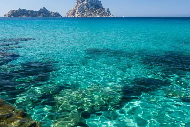 San Antonio: Es Vedrà Cruise with Drinks and Snacks — a boat tour from Ibiza, Spain