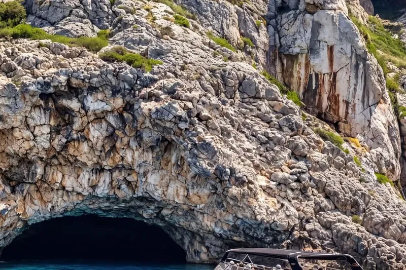 From Kotor: 3h Blue Cave, Swimming and War Tunnels Tour — a boat tour from Kotor, Montenegro