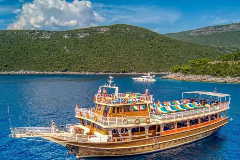 Tivat/Kotor: Boka Bay Full-Day Guided Cruise with Swim Stop — a boat tour from Kotor, Montenegro
