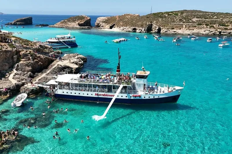 Malta Boat: Comino Blue Lagoon, Crystal Lagoon, Gozo & Caves — a boat tour from Malta, Malta