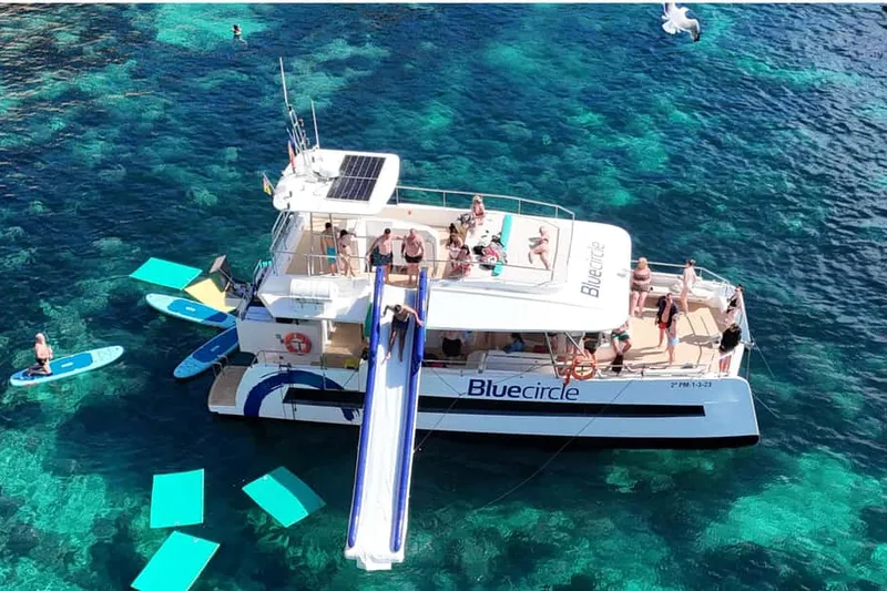 Palma: Deluxe Catamaran with Snacks, Drink, SUP & Snorkeling — a boat tour from Palma de Mallorca, Spain