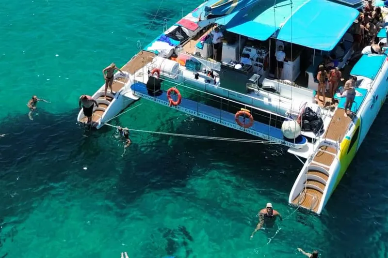 From Palma de Mallorca: 3.5-Hour Catamaran Cruise with Tapas and a Swim — a boat tour from Palma de Mallorca, Spain