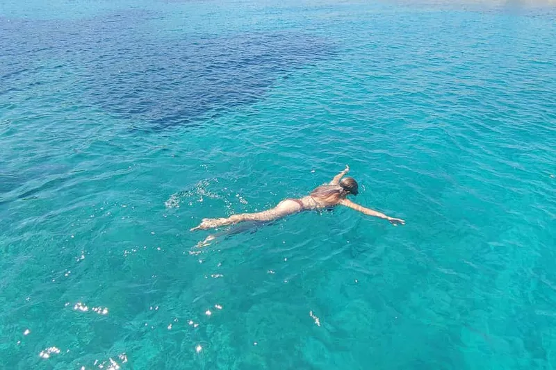 Antiparos & Despotiko Kaiki Cruise — Coves, Swim & BBQ — a boat tour from Paros, Greece