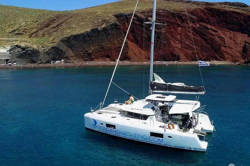 Sunset Cruise with Swim Stops, Dinner, and Drinks — a boat tour from Santorini, Greece