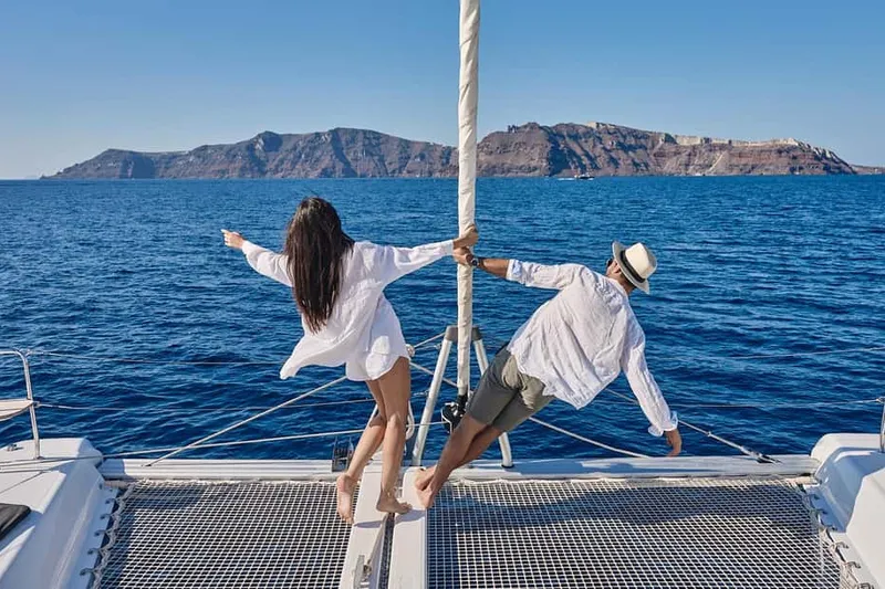 Caldera Catamaran Cruise w BBQ Meal & Drinks — a boat tour from Santorini, Greece